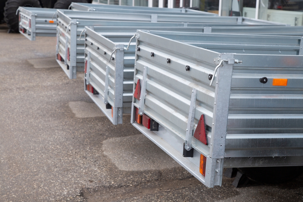 Open car trailer. Trailer for passenger cars.Sale, rental and maintenance of trailers.